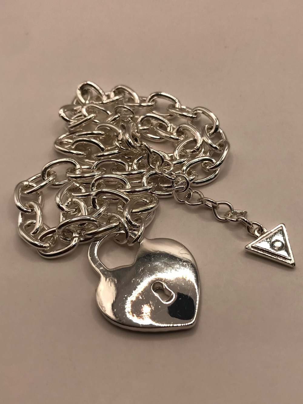 GUESS Silver-Tone Heart Lock Charm Necklace with Rhinestones - Picture 6 of 7